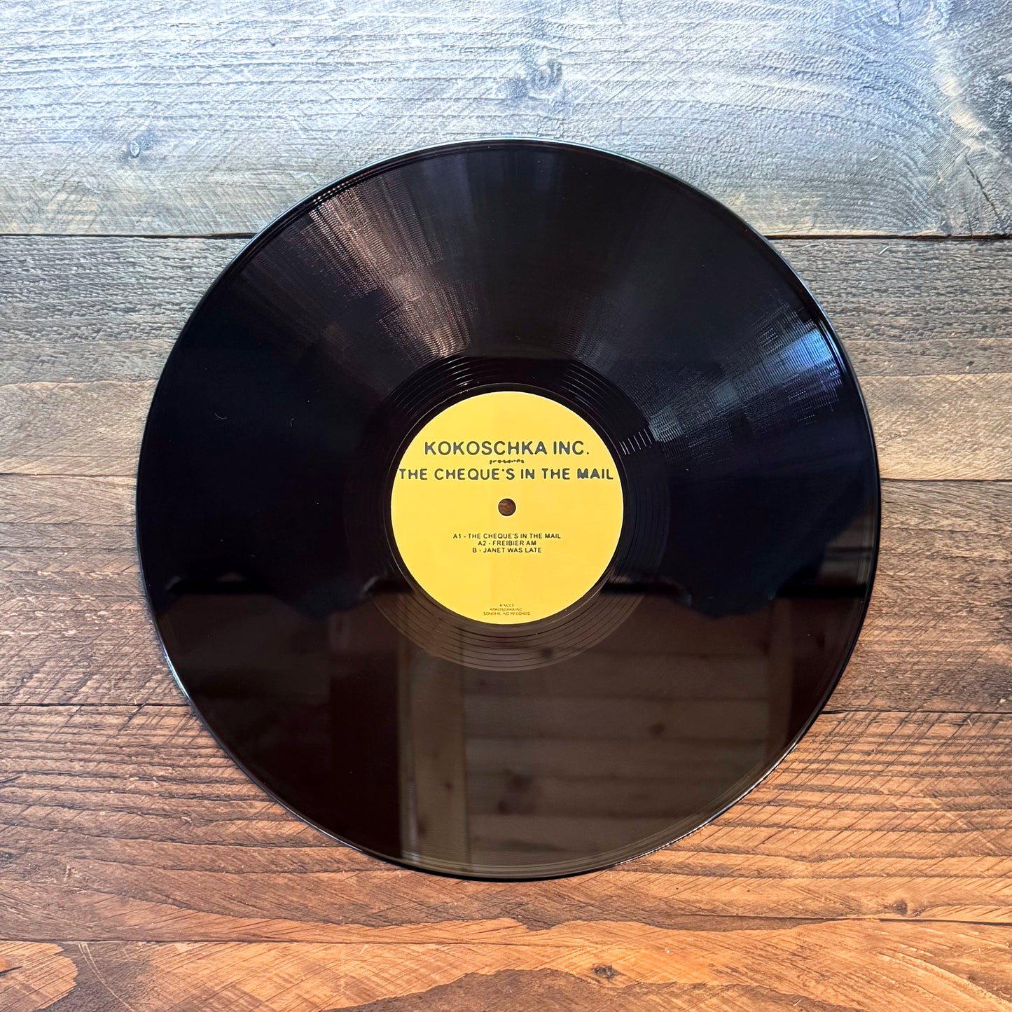 Kokoschka "The cheque's in the mail", black 12", (Kinc03)