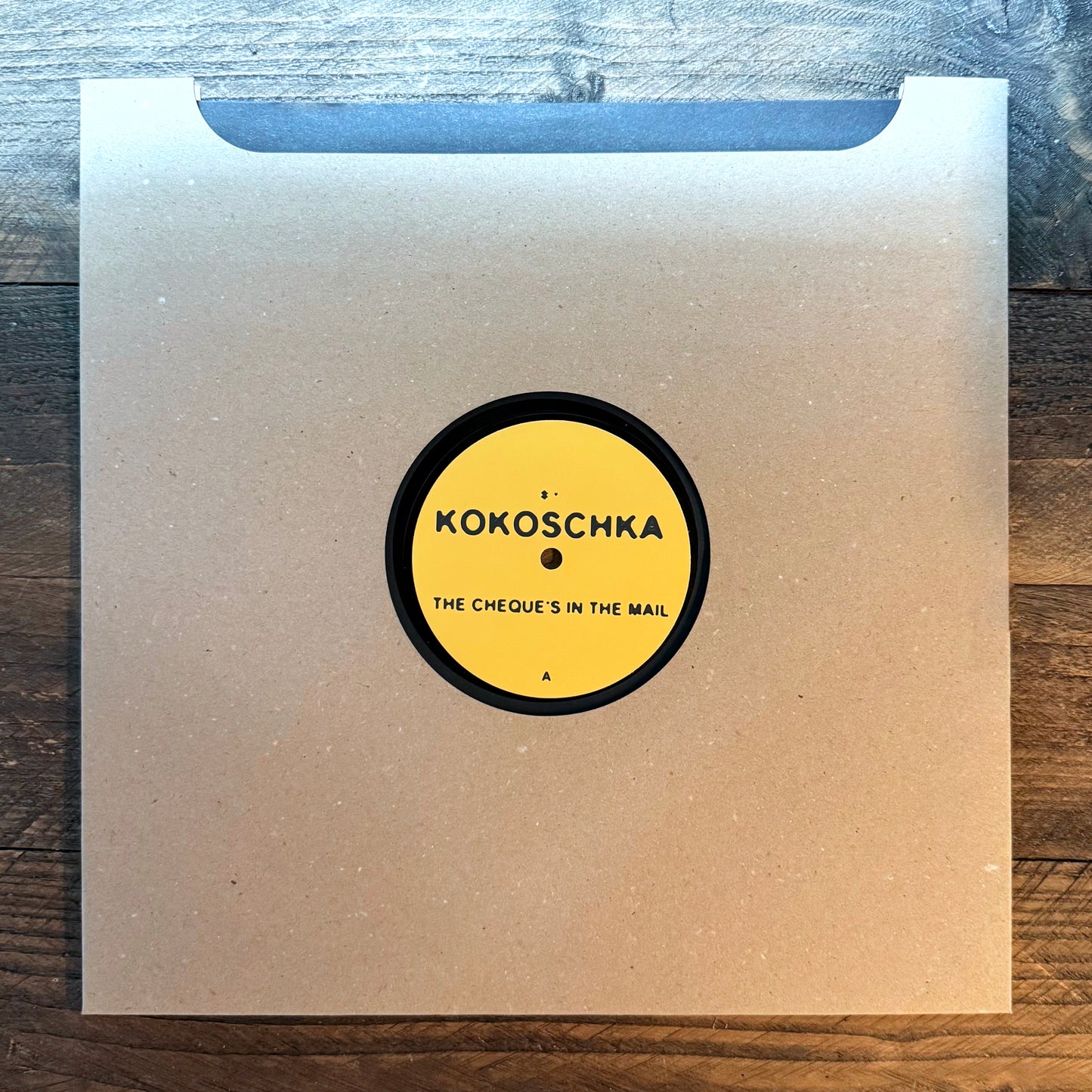 Kokoschka "The cheque's in the mail", black 12", (Kinc03)